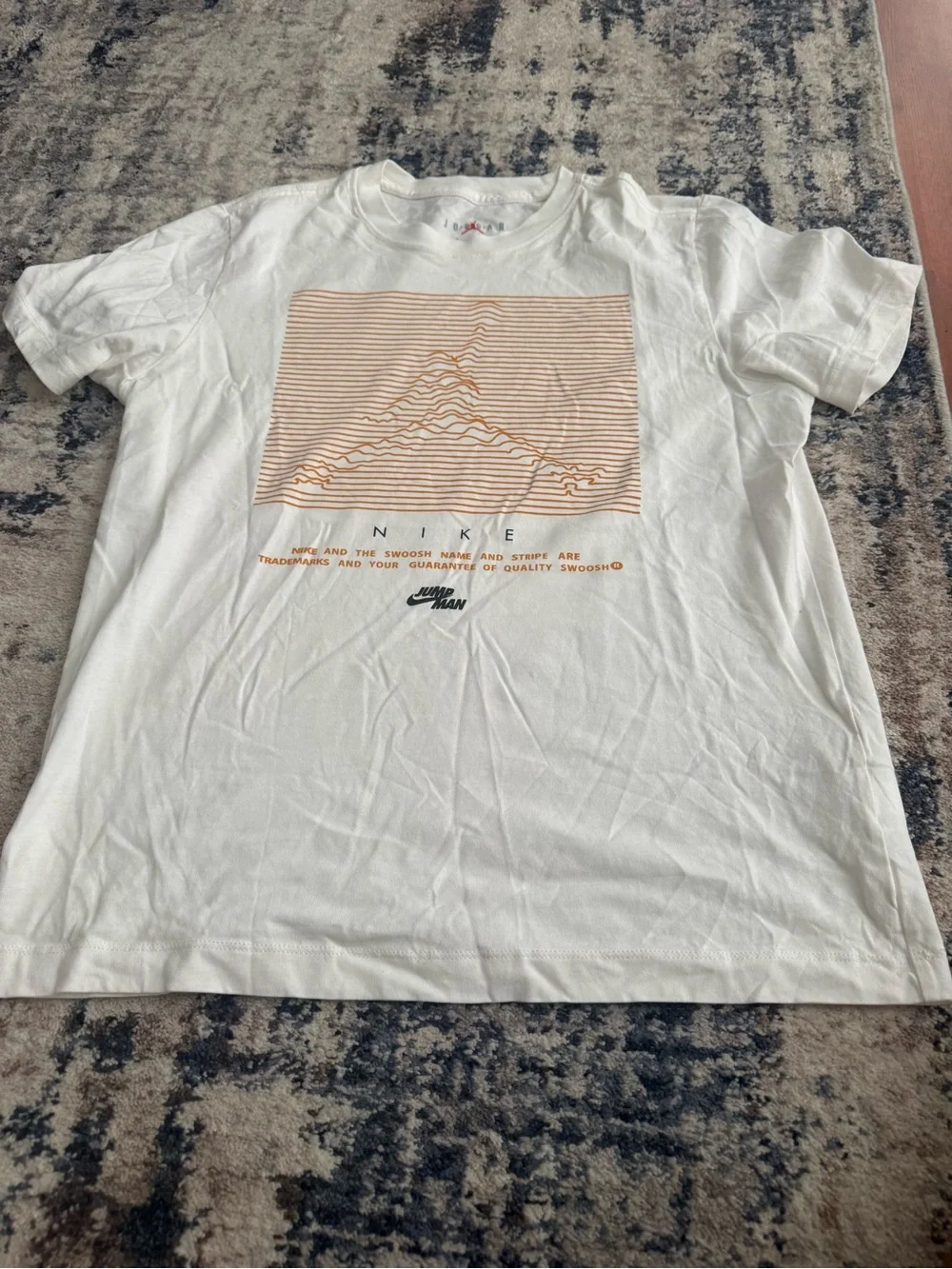 Jordan White Tee with Mustard Jumpman and Orange/Mustard Stripe Pattern
